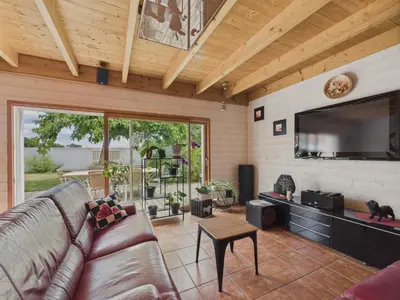 Coin salon dans l'établissement Belle et spacieuse maison au calme pour 8