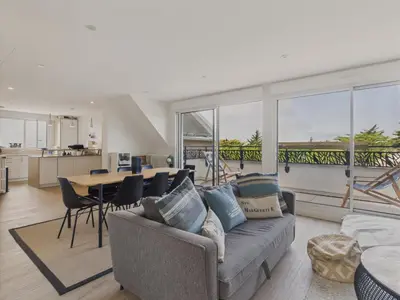 Coin salon dans l'établissement 180m de la plage appartement 4 adultes - 4 enfants