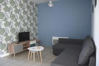 Télévision ou salle de divertissement dans l'établissement Gîtes de l'ancienne école, 24 personnes