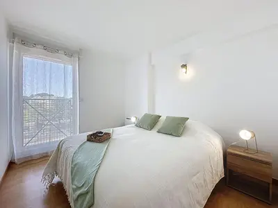 Un ou plusieurs lits dans un hébergement de l'établissement Apartment Les Roches by Interhome