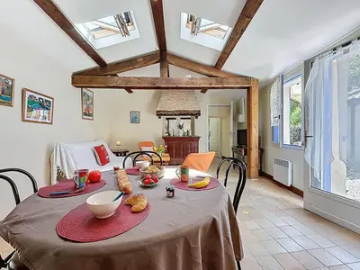 Coin salon dans l'établissement Holiday Home Le Sandier-1 by Interhome