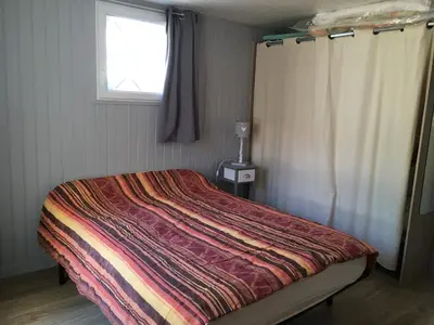 Un ou plusieurs lits dans un hébergement de l'établissement Appartement rénové avec terrasse très bien situé