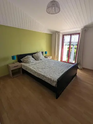 Un ou plusieurs lits dans un hébergement de l'établissement Chambres à La Flocellière, à 15min du PuyduFou