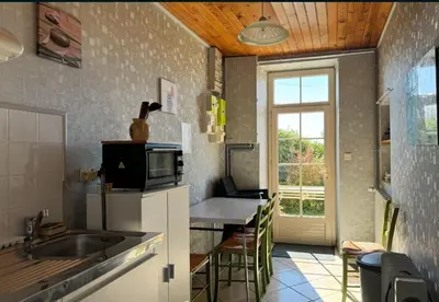 Cuisine ou kitchenette dans l'établissement Chambres à La Flocellière, à 15min du PuyduFou