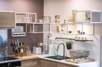 Cuisine ou kitchenette dans l'établissement La Maison d'Adèle