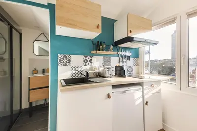 Cuisine ou kitchenette dans l'établissement Studio Bel Ami - Nantes centre ville
