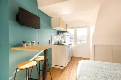 Cuisine ou kitchenette dans l'établissement Studio Bel Ami - Nantes centre ville