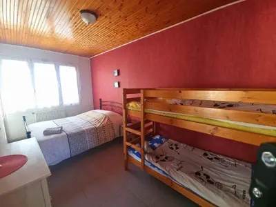 Un ou plusieurs lits dans un hébergement de l'établissement maison mer et soleil