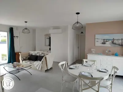 Coin salon dans l'établissement Charmant gîte avec terrasse à La Barre-de-Monts - FR-1-426-586