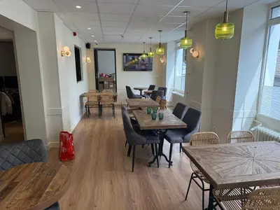 Coin salon dans l'établissement Arcades Hôtel - Cholet