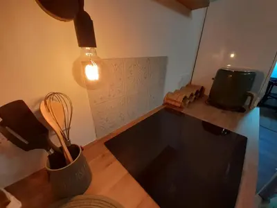 Coin salon dans l'établissement Le logis d'Emerance