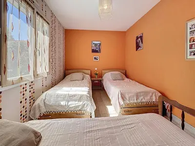 Un ou plusieurs lits dans un hébergement de l'établissement Holiday Home Villa Sel et Pins by Interhome