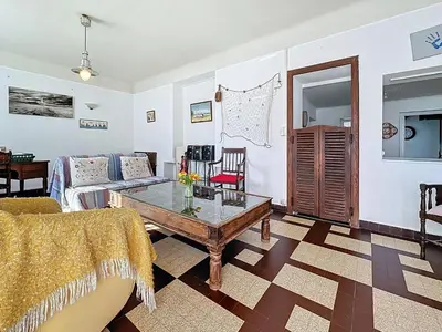 Coin salon dans l'établissement Holiday Home Les Volets Bleus by Interhome