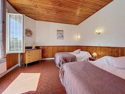 Un ou plusieurs lits dans un hébergement de l'établissement Holiday Home Brin de Muguet by Interhome
