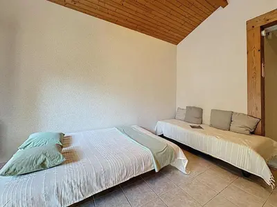 Un ou plusieurs lits dans un hébergement de l'établissement Holiday Home Epicea by Interhome