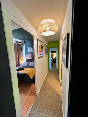 Un ou plusieurs lits dans un hébergement de l'établissement Cottage du collectionneur