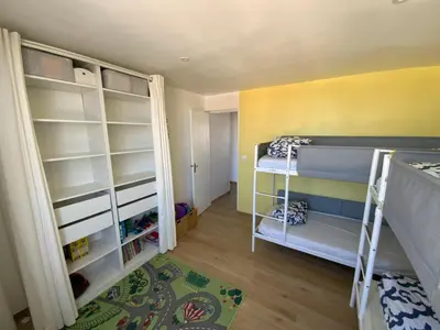 Un ou plusieurs lits dans un hébergement de l'établissement NOUVEAU Appartement rénové Face à la Mer 70 m2 de confort et de Charme à Saint Jean de Monts