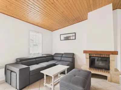 Coin salon dans l'établissement Jardin et véranda - Maison 4 adultes 2 enfants