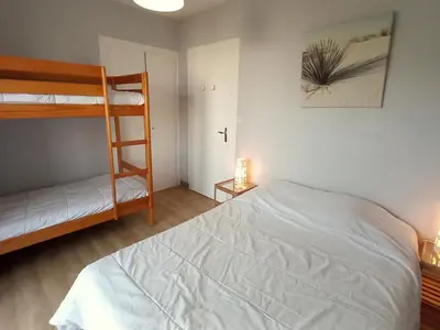 Un ou plusieurs lits dans un hébergement de l'établissement Appartement 5 pers au calme, proche plage à St Jean de Monts - FR-1-323-587