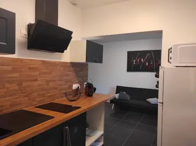 Cuisine ou kitchenette dans l'établissement Logement calme entre Terre et Mer