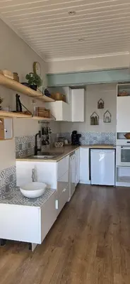 Cuisine ou kitchenette dans l'établissement La tribu des petits mouss' - 14 pers max