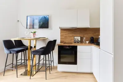 Cuisine ou kitchenette dans l'établissement La Trilogie Choletaise Netflix, Prime Video, Disney plus