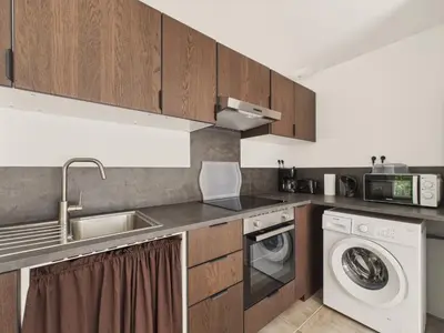 Cuisine ou kitchenette dans l'établissement Appart pour 2 à St-Jean-de-Mont avec jardin