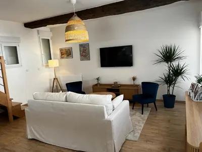 Télévision ou salle de divertissement dans l'établissement Maison 80 m2 à 5mn de Nantes