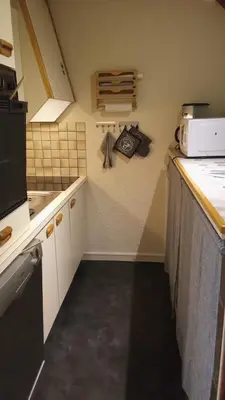 Cuisine ou kitchenette dans l'établissement Bel appartement à 100m de la plage avec parking privé