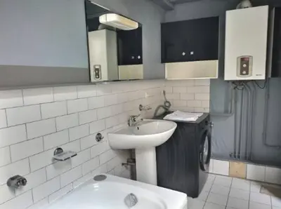 Salle de bains dans l'établissement Place du Temps, appartement de caractère plein centre