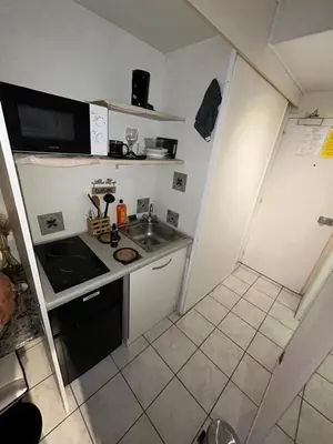 Cuisine ou kitchenette dans l'établissement Les temps Heureux