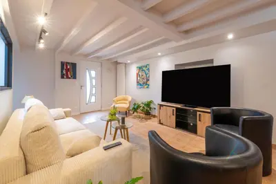 Télévision ou salle de divertissement dans l'établissement Closerie de la Picardie - Proche D'Angers