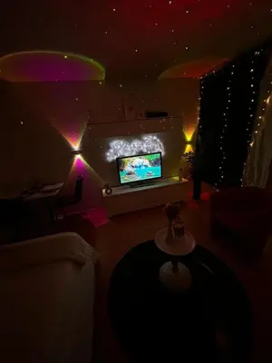 Télévision ou salle de divertissement dans l'établissement Évasion Nuageuse