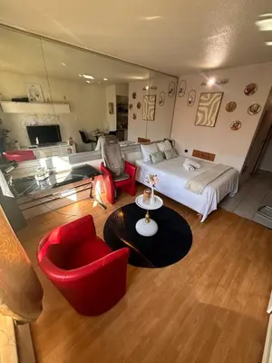 Télévision ou salle de divertissement dans l'établissement Évasion Nuageuse