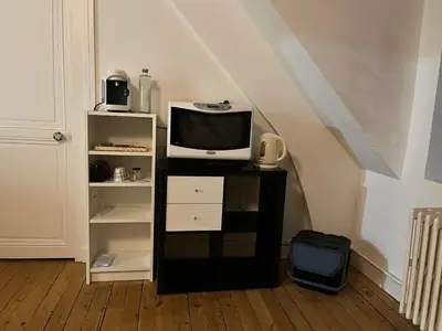 Cuisine ou kitchenette dans l'établissement Appartements des Halles - Chambres d'Hôtes