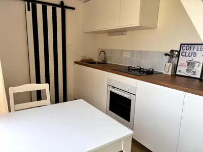 Cuisine ou kitchenette dans l'établissement Tiny House cosy