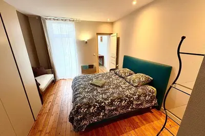 Un ou plusieurs lits dans un hébergement de l'établissement Bright apartment for 4 people in Nantes