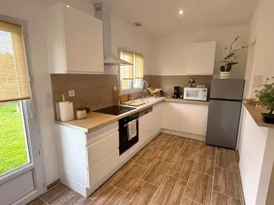 Cuisine ou kitchenette dans l'établissement charmante maison
