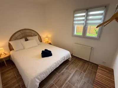 Un ou plusieurs lits dans un hébergement de l'établissement charmante maison
