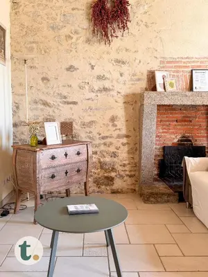 Coin salon dans l'établissement Tranquiloue - Calme & Charme - 17min du Puy du Fou