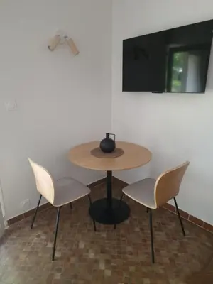 Télévision ou salle de divertissement dans l'établissement Studio chaleureux de 30m2