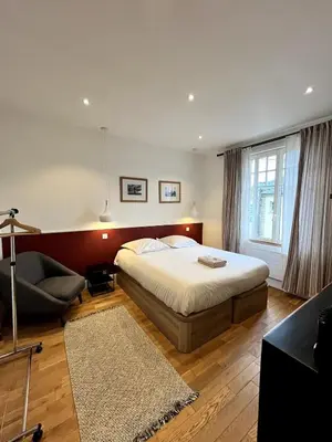 Un ou plusieurs lits dans un hébergement de l'établissement Intemporel 4 pers 2 chambres TV WiFi