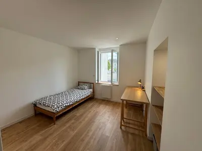 Un ou plusieurs lits dans un hébergement de l'établissement Maison Petit Auverné