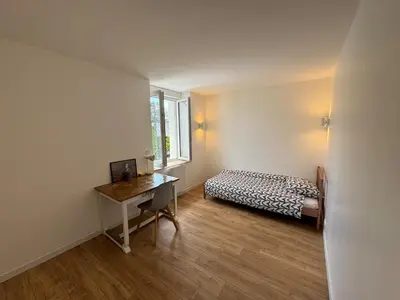 Un ou plusieurs lits dans un hébergement de l'établissement Maison Petit Auverné