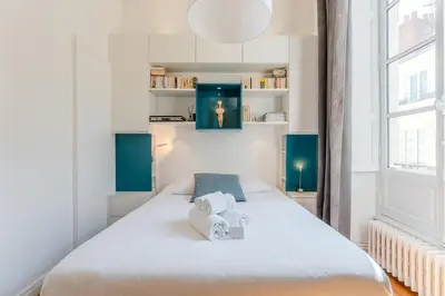 Un ou plusieurs lits dans un hébergement de l'établissement Hélios - Élégant appartement de 115 m² à Nantes