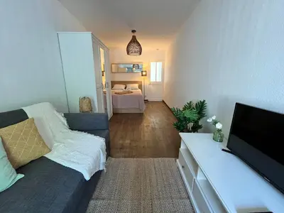 Un ou plusieurs lits dans un hébergement de l'établissement Instant Cosy 2pers Tv Wifi