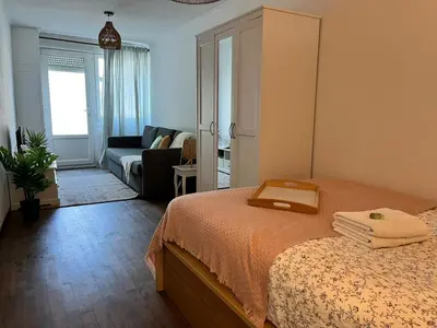Un ou plusieurs lits dans un hébergement de l'établissement Instant Cosy 2pers Tv Wifi