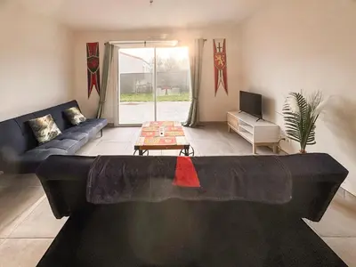 Coin salon dans l'établissement Maison 5-6 personnes -15 min du Parc - Parking -by R&G