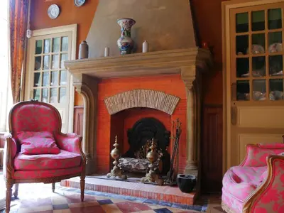 Coin salon dans l'établissement Château de la Garlais - 29 couchages
