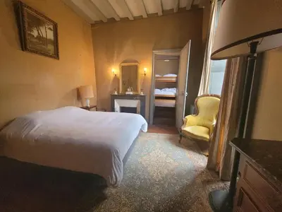 Un ou plusieurs lits dans un hébergement de l'établissement Château de la Garlais - 29 couchages